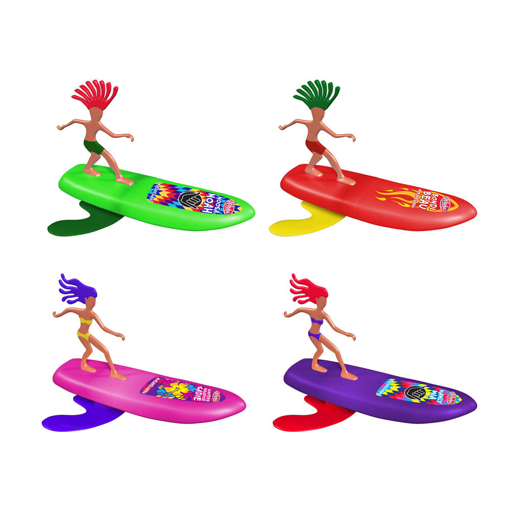 Four colorful surfer toy figures: two boys on green and red boards, two girls on pink and purple surfboards