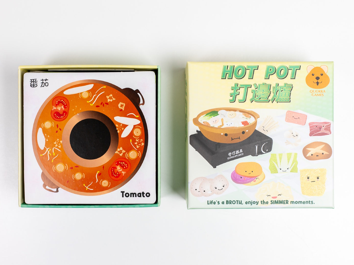Hot Pot card game box (Quokka Games) and open card showing a tomato hot pot base illustration