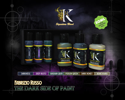 Six K-branded Fabrizio Russo miniature paint bottles in various dark colors, displayed against a gothic-themed background