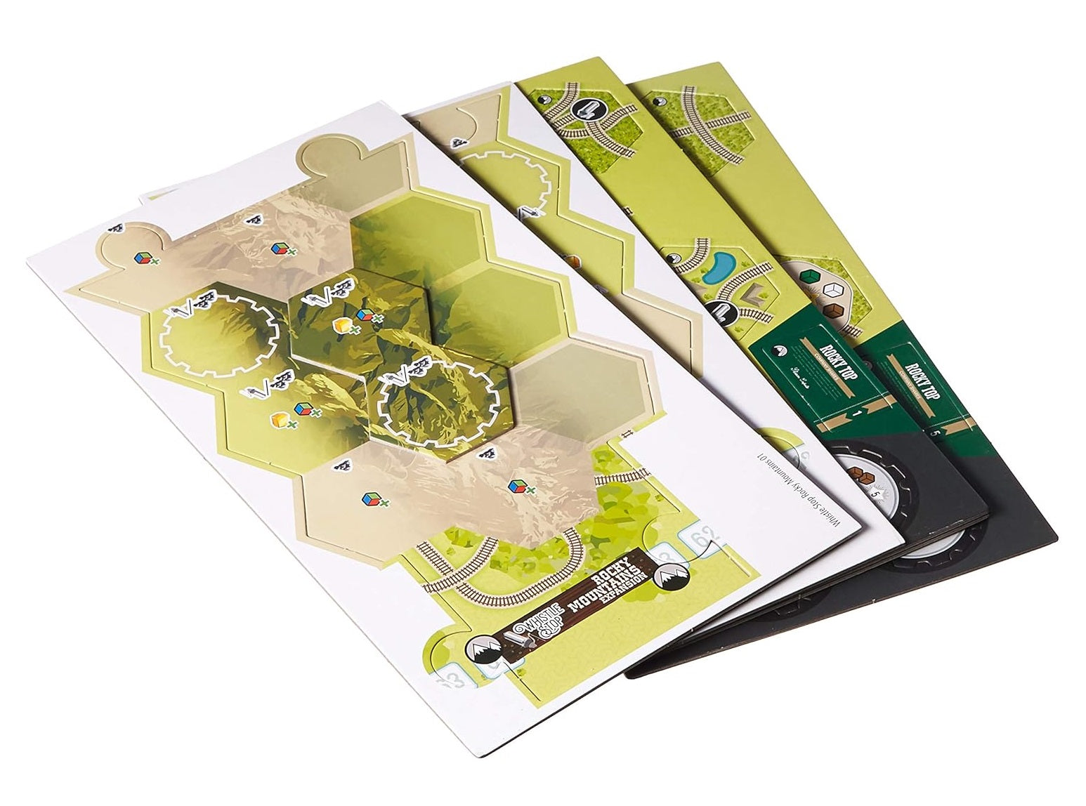 Stacked Whistle Stop Rocky Mountains Expansion board game pieces, showing hex terrain and train tracks.