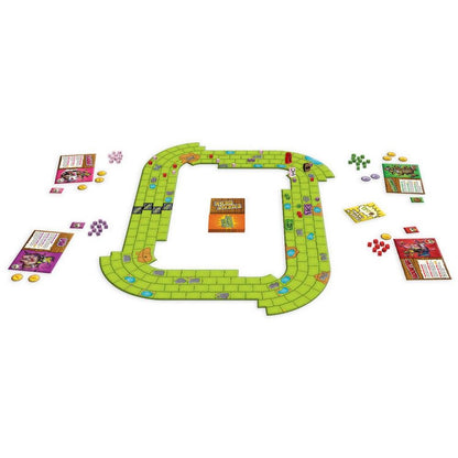 A vibrant board game setup on a white surface, featuring a green square track, cards, and various colorful tokens