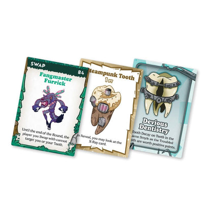 Three fantasy-themed game cards show a purple monster, a steampunk tooth, and a tooth with braces