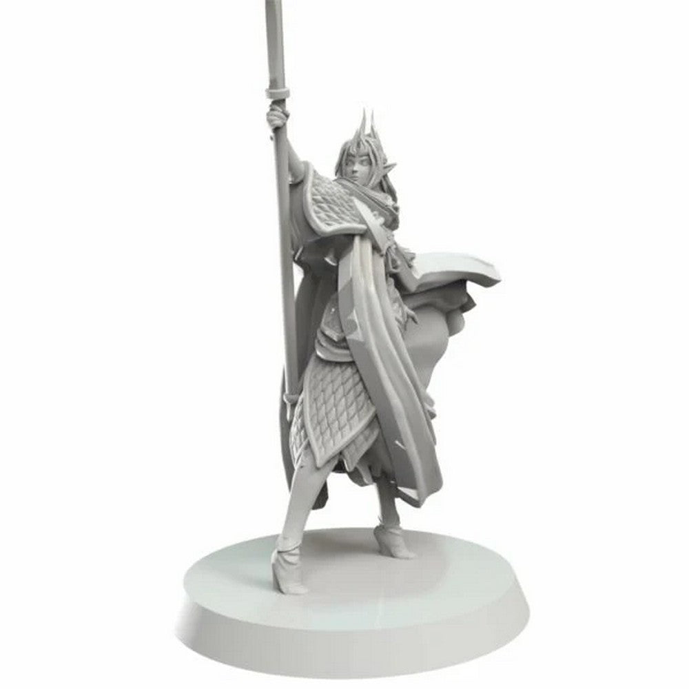 An unpainted gray miniature of an armored elf-like figure holding a staff upright
