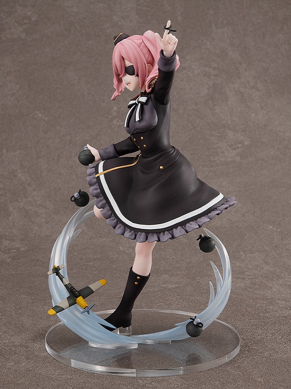 Annett figure back view highlighting coat and base design