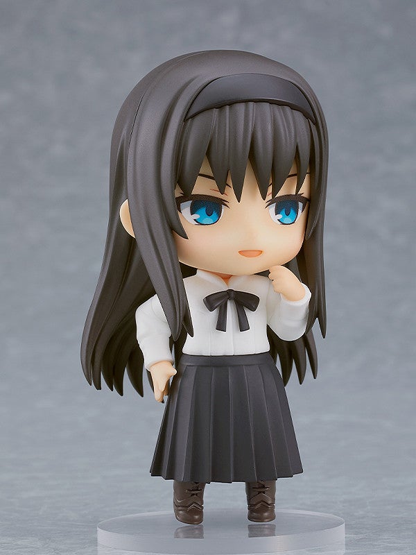 Nendoroid anime figure with long dark hair blue eyes white collared shirt black bow tie and pleated black skirt