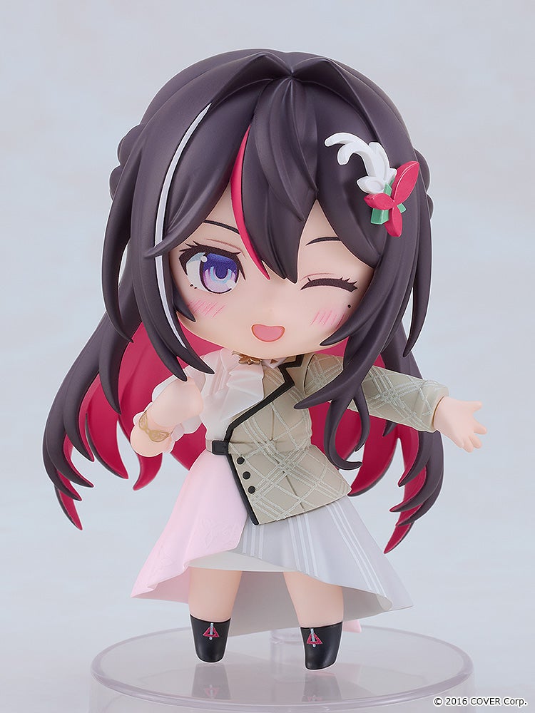 Rear view showing twin tails and frilled costume details