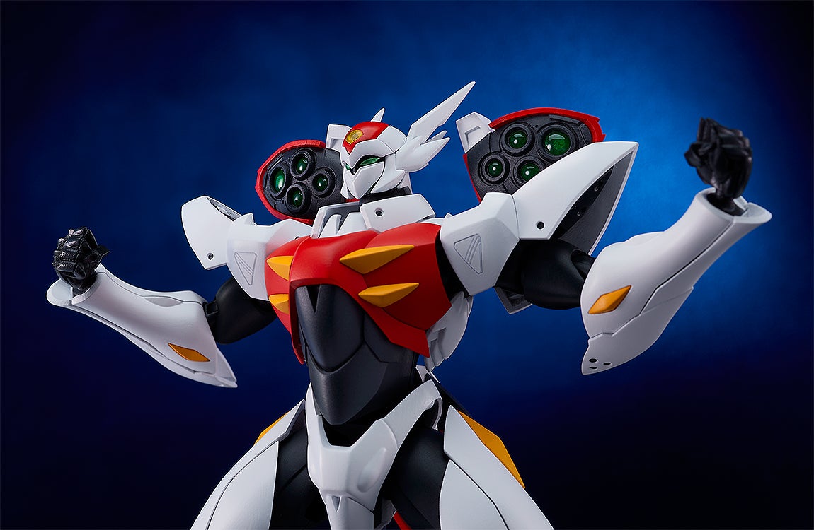White, red, and black robot figure with green-lensed shoulder pods stands with clenched fists against a dark blue background