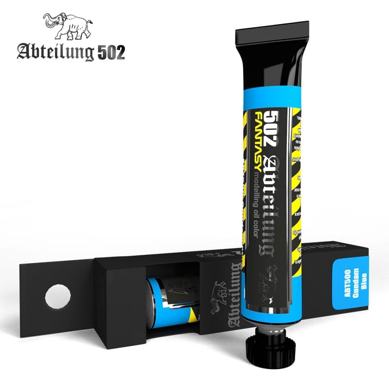 Abteilung 502 Gundam Blue oil paint tube stands next to its open black box, revealing another tube inside