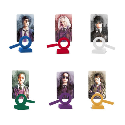 Six mystery game tokens: character portraits paired with colored magnifying glass plastic playing pieces