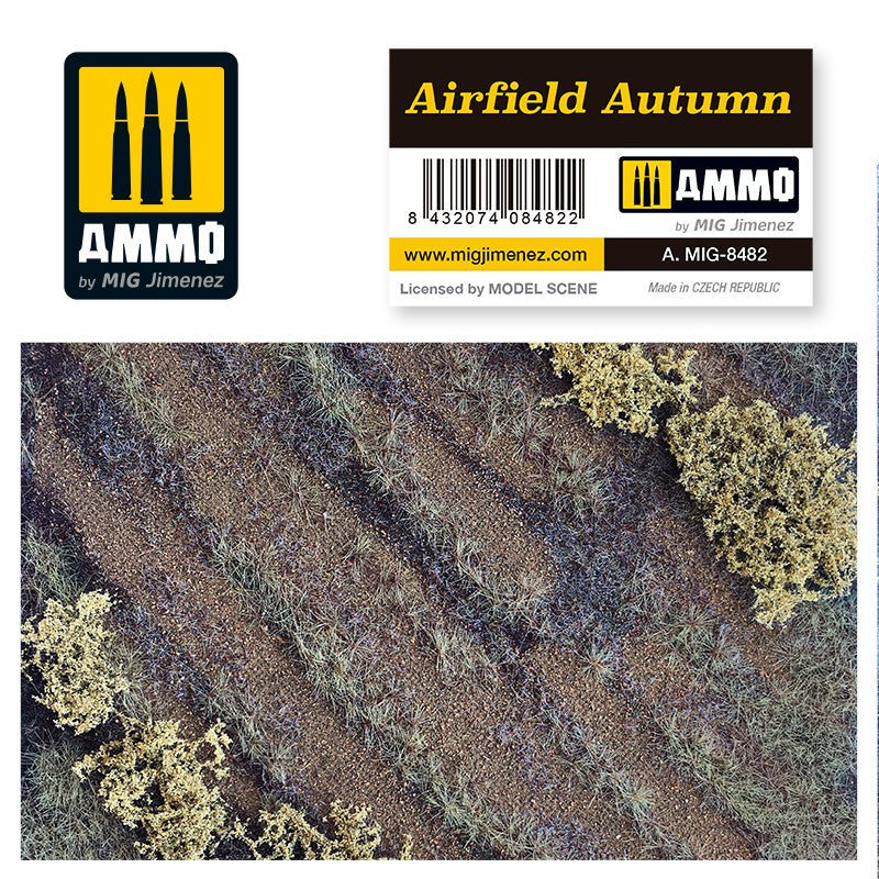 AMMO by MIG Jimenez 'Airfield Autumn' model terrain, featuring dry grass, dirt paths, and sparse autumn bushes.