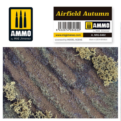 AMMO by MIG Jimenez 'Airfield Autumn' model terrain, featuring dry grass, dirt paths, and sparse autumn bushes.
