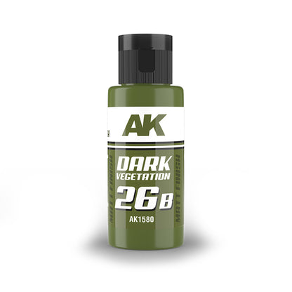 A dark green AK Interactive 'Dark Vegetation' model paint bottle with a black cap, matt finish
