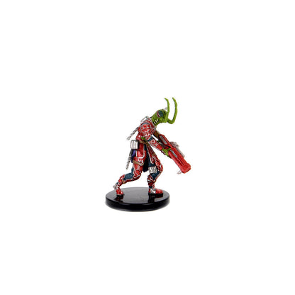 Green insectoid alien miniature in red armor, holding a red rifle, moving forward