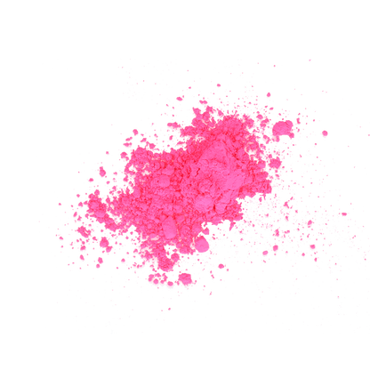Neon pink powder piled and scattered on a white background.