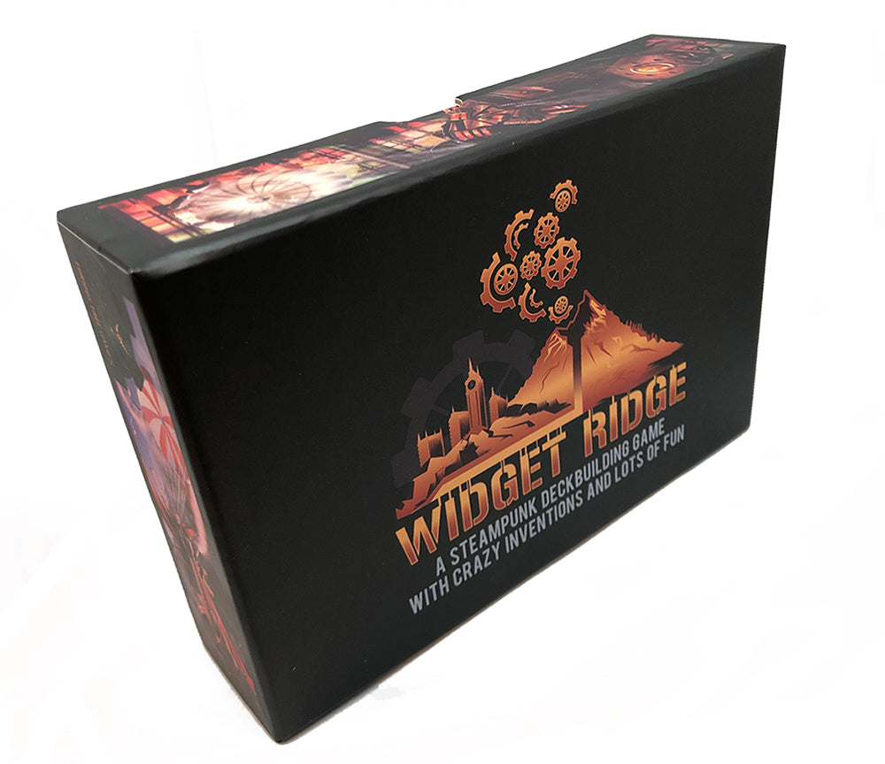 Black box for Widget Ridge, a steampunk deckbuilding game, with golden gears, city and mountain artwork