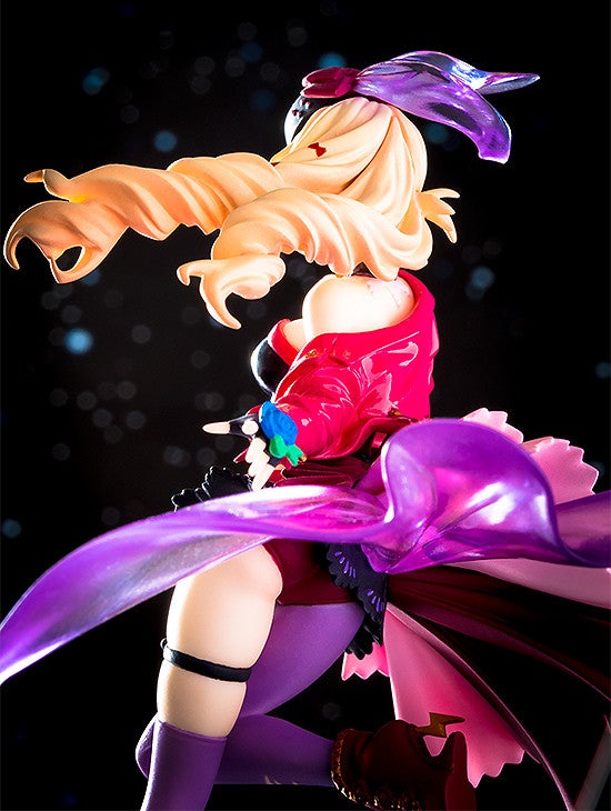 Anime figure with blonde hair pink and purple costume and large purple scarf