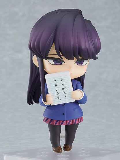 Shoko Komi Nendoroid holding a notebook with a shy expression
