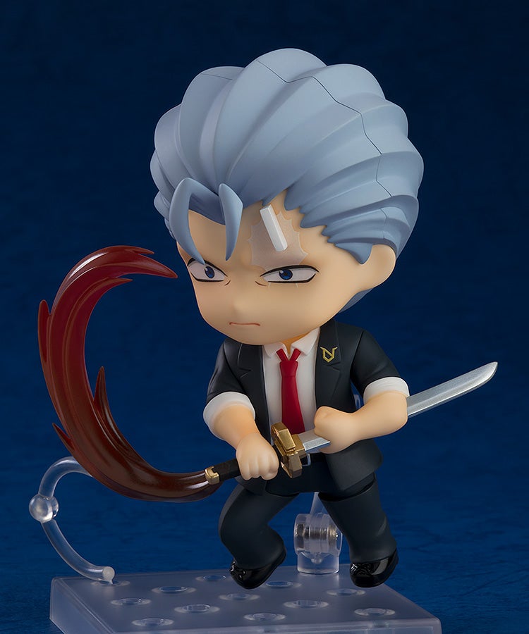 Close-up of Andy with alternate gritted-teeth expression and crossed arms pose