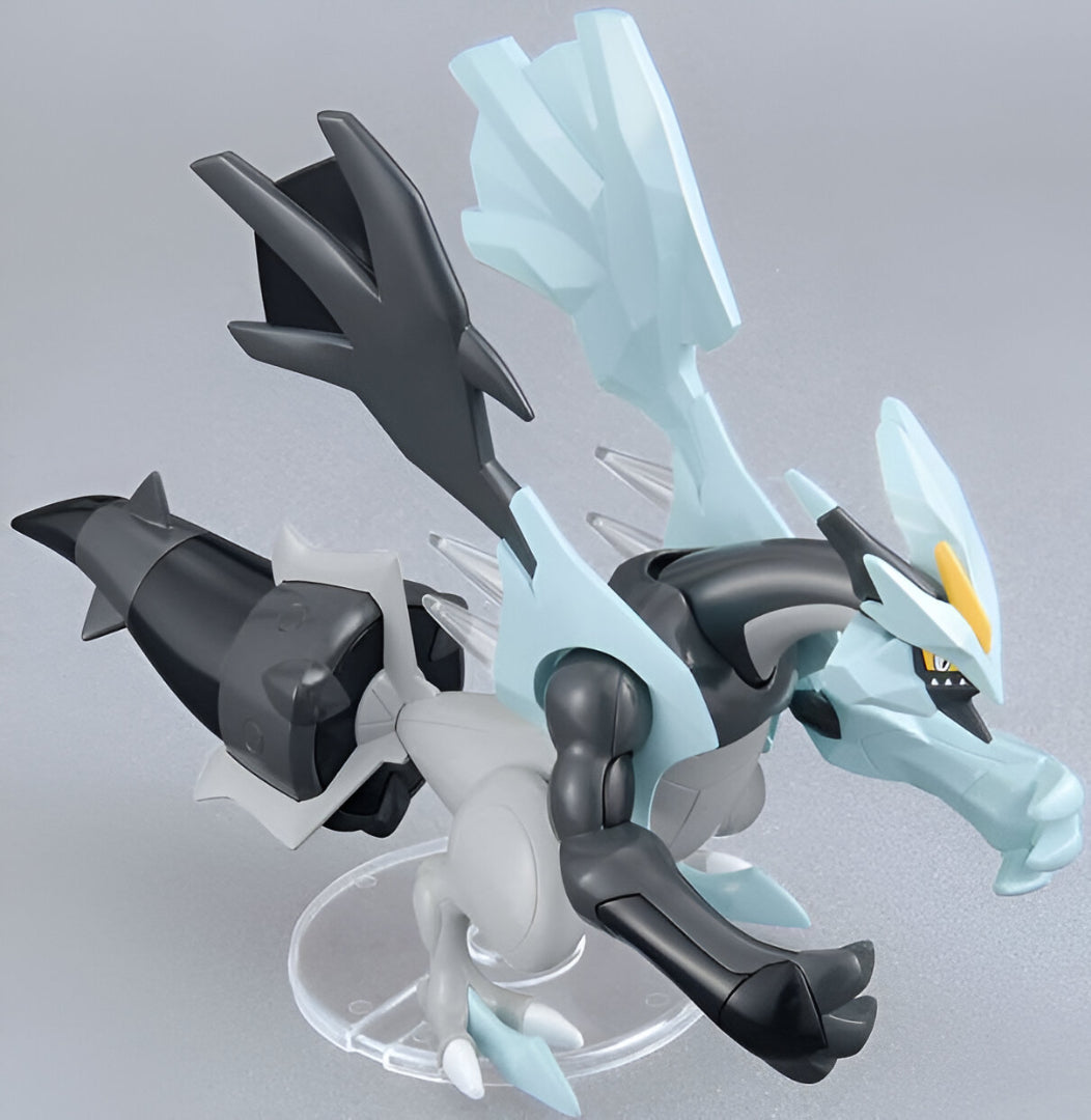 Plastic model of the Pokémon Kyurem, a black and icy blue dragon, posed dynamically on a clear stand