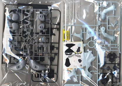 Ice blue and black plastic model kit parts on runners, sealed in clear packaging with decals