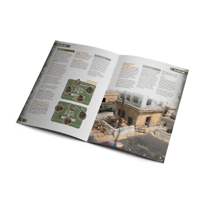 Open wargame rulebook with tactical diagrams on the left and a detailed miniature battlefield photo on the right