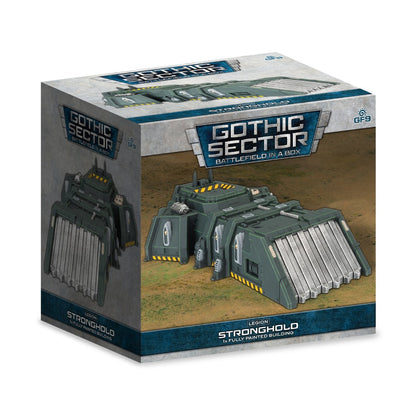 The product box for Gothic Sector - Legion Stronghold displays a dark green, futuristic building with a large corrugated door and yellow markings