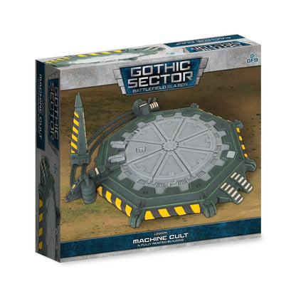 A box for Gothic Sector Machine Cult features a hexagonal futuristic building with green, grey, and yellow hazard stripes