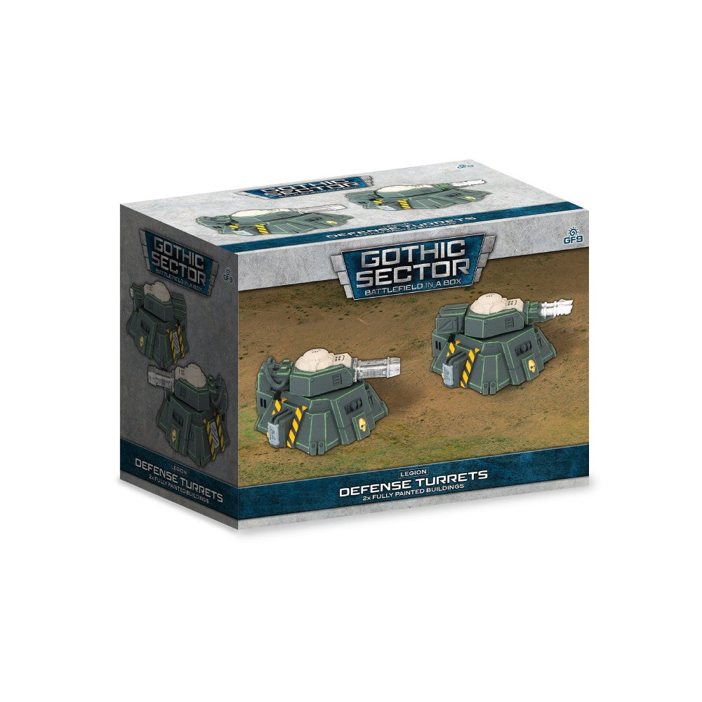 Box for 'Gothic Sector Defense Turrets' showing two dark green, futuristic miniature turrets on a brown battlefield