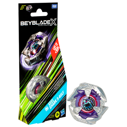 A Beyblade X 'Keel Shark 3-60LF' toy. One purple/silver top in package, another unpacked. Box says 'LET IT RIP!'