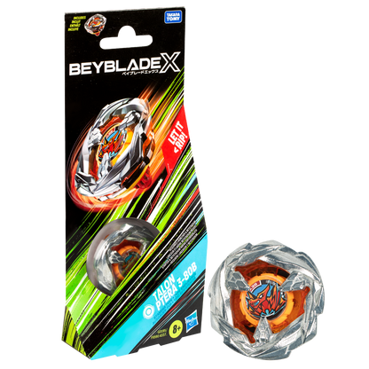A black and green Beyblade X package featuring a silver and orange Beyblade, with an identical unboxed Beyblade to the right