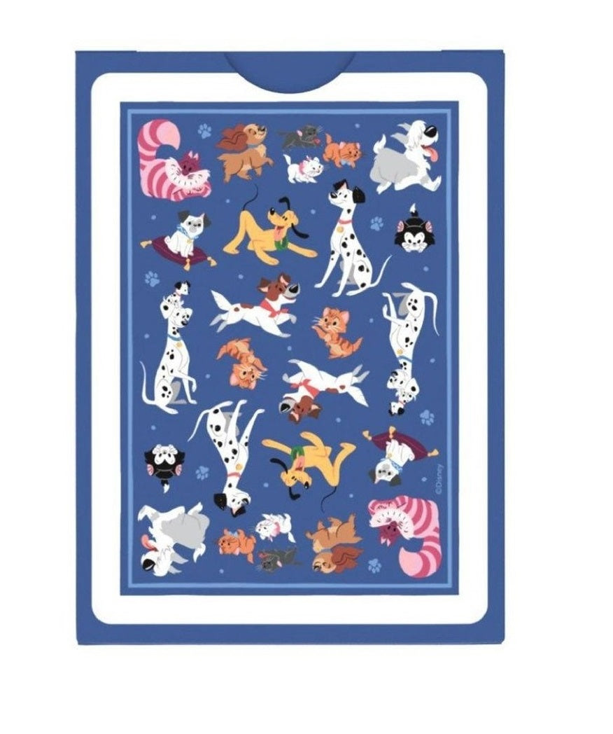 Pattern of stylized Disney dogs and cats (Dalmatians, Pluto, Cheshire Cat) on a dark blue background