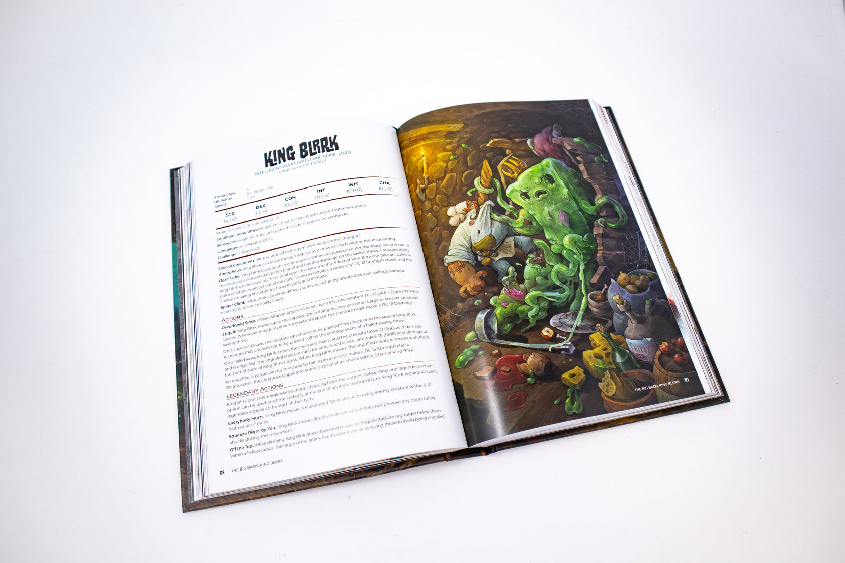 Open TTRPG book: Left page details 'King Blork' stats, right page shows a vibrant illustration of the green tentacled monster attacking a chef in a cluttered dungeon kitchen
