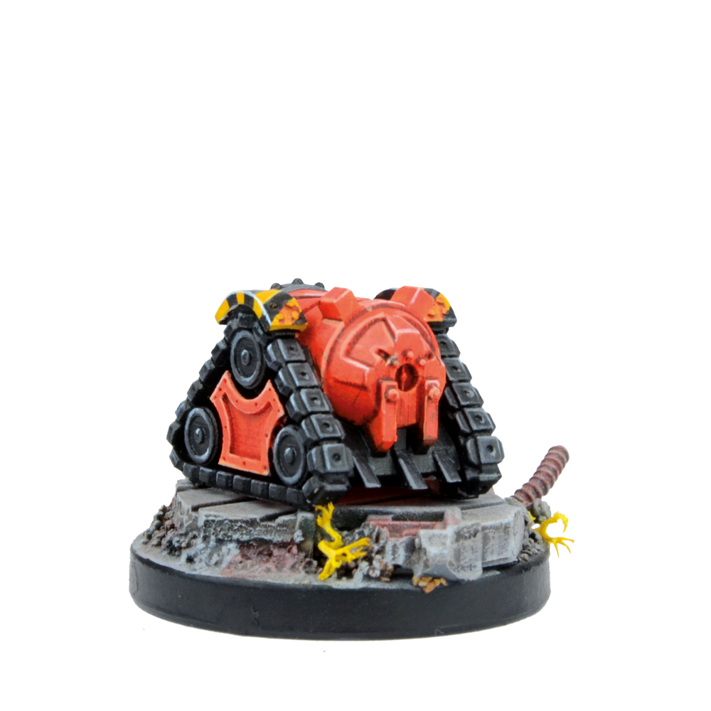 A red and black miniature sci-fi tank model with yellow hazard stripes, on a detailed rubble base