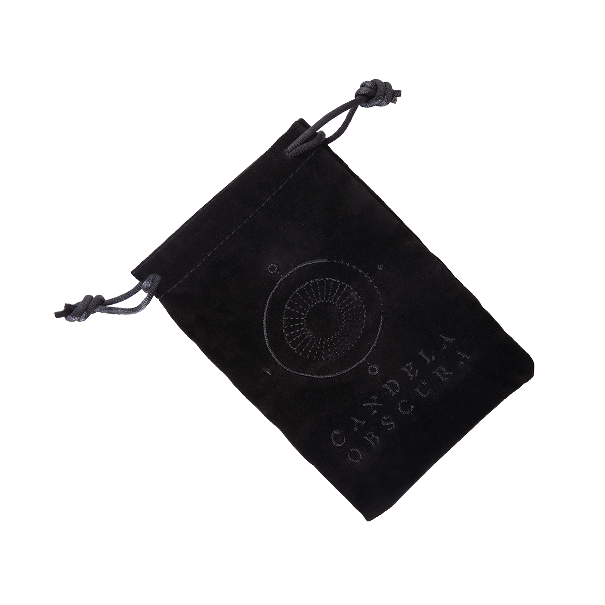 Black velvet dice bag featuring an embroidered eye logo and "CANDELA OBSCURA" text, angled on white