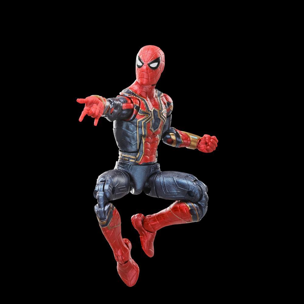 A Spider-Man Iron Spider action figure in a red, blue, and gold suit, posed leaping with one arm extended on a black background