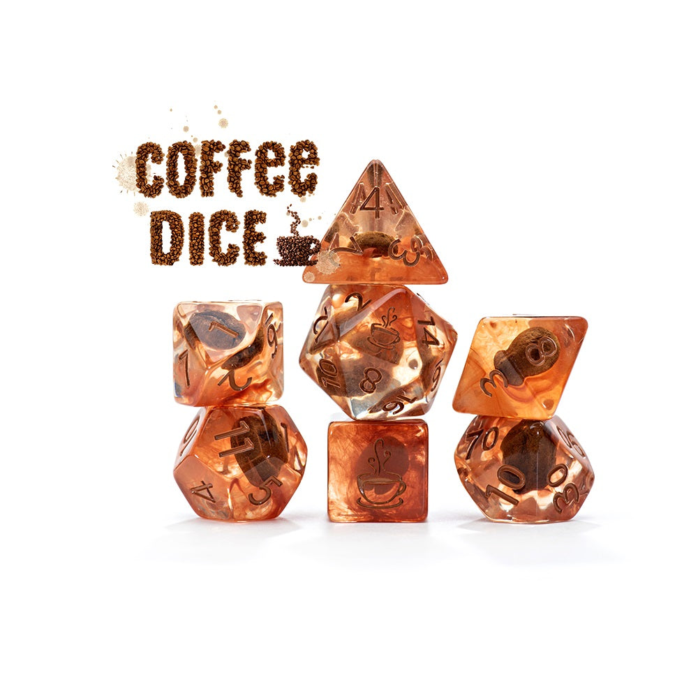 Amber resin polyhedral coffee dice containing coffee beans, displayed against a white background