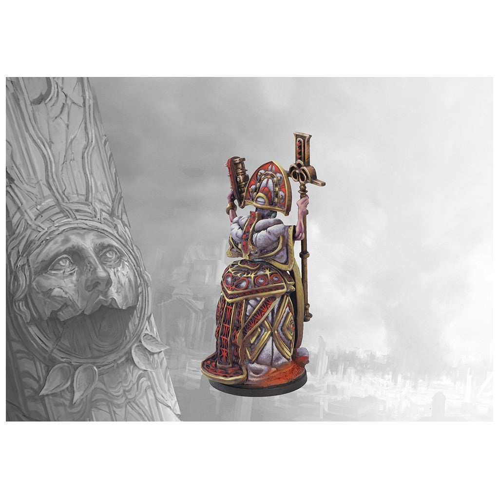 Miniature figure of an ornate, robed priest holding a crozier and a gun, beside a massive carved stone face