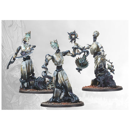 Three painted miniatures of corrupted female statues with black tendrils holding weapons