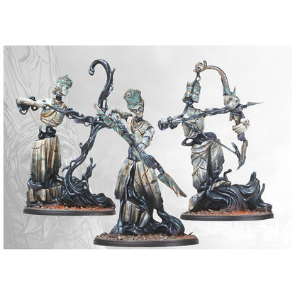 Set of three fantasy miniatures of reanimating stone statues with dark tendrils, two holding weapons
