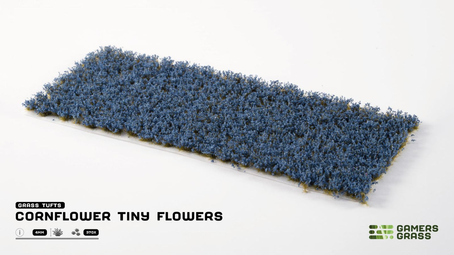 Blue cornflower tiny flower tufts on a strip, used for miniature basing and dioramas