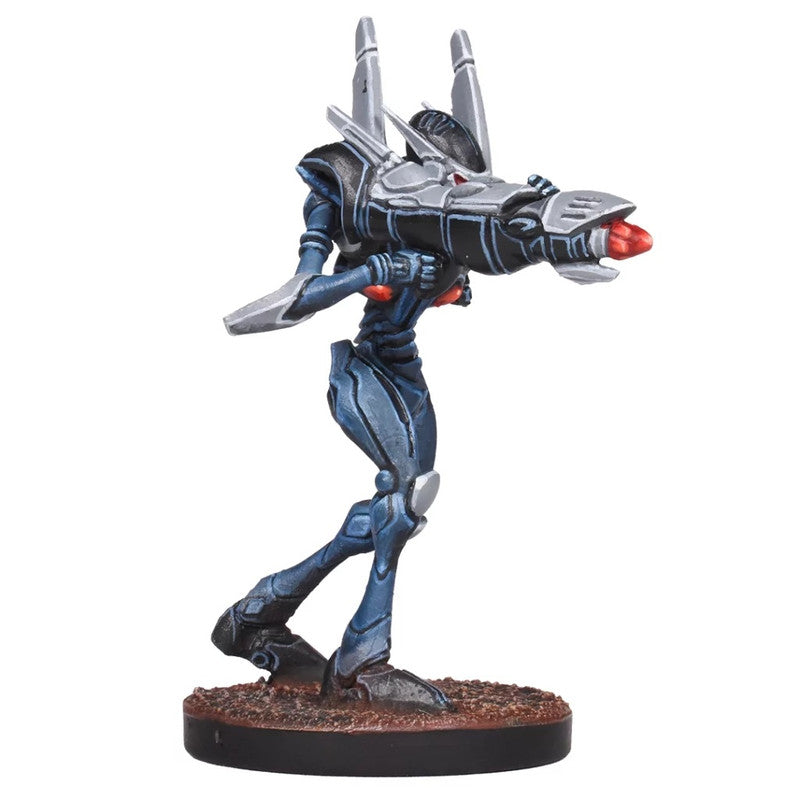 A sleek blue and silver robot miniature with tall head fins and a large cannon, standing on a textured base