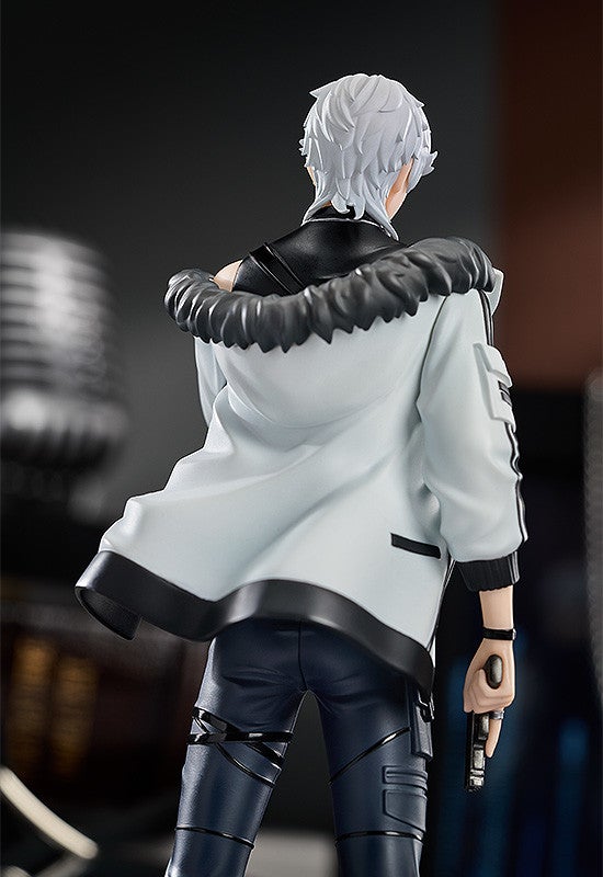 Anime figure of a person with white hair in a white jacket with black trim holding a black gun