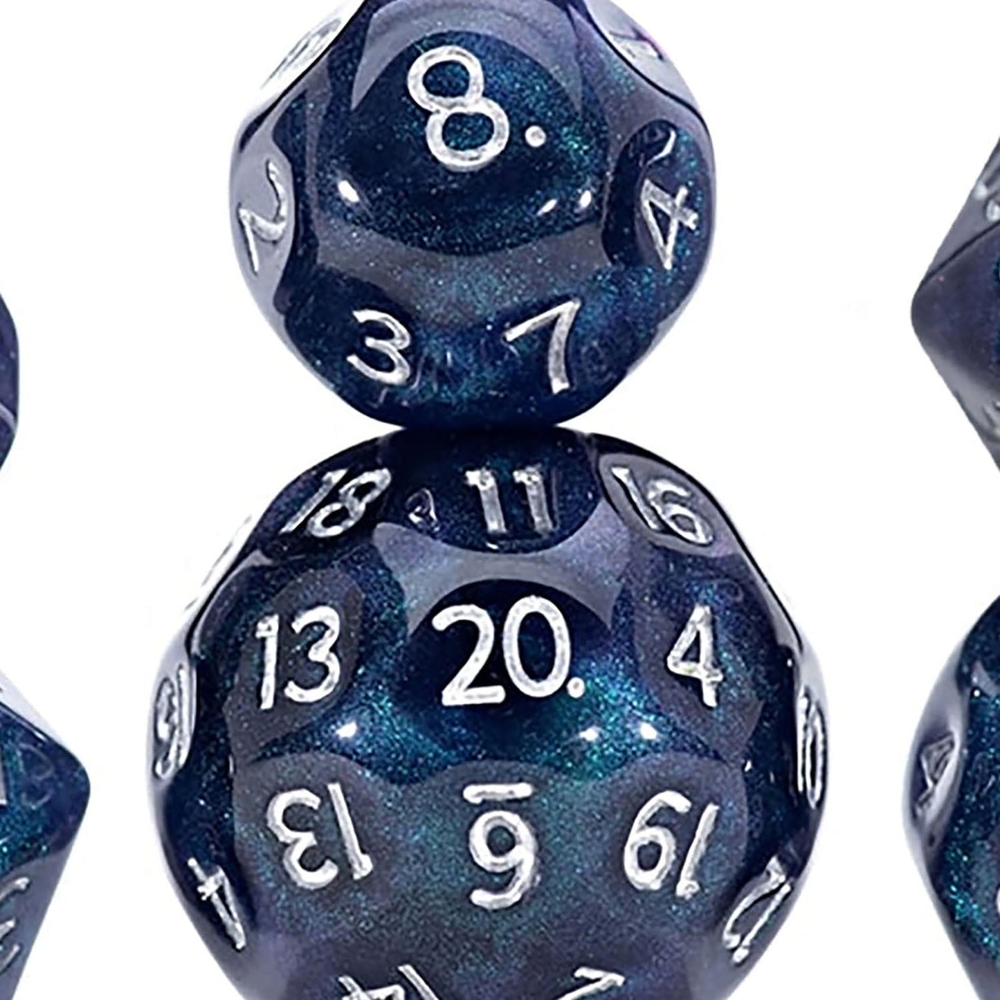 Glittery dark blue polyhedral dice, a d8 showing 8 stacked on a d20 showing 20, with silver numbers