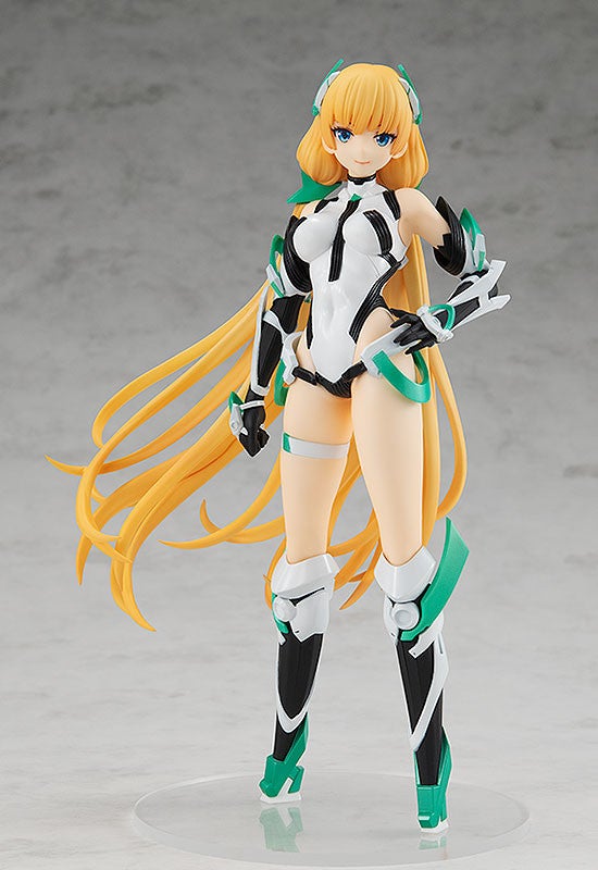Anime figurine of a female character with long blond hair and a white and green futuristic outfit
