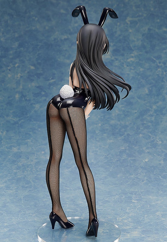 Anime figure of a woman with black hair and bunny ears wearing a black bunny suit and fishnet stockings