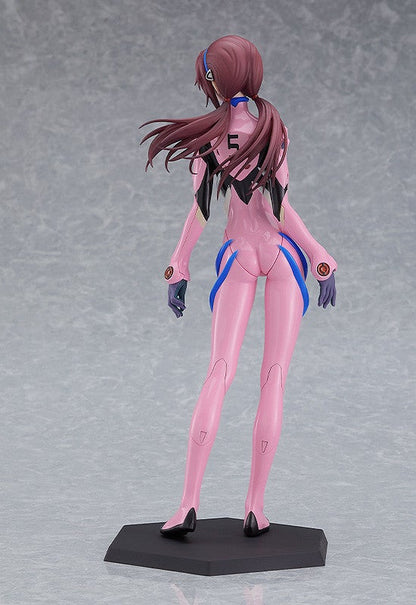 Pink-suited anime figure with long flowing hair and '5' on her back, viewed from behind, standing on a base