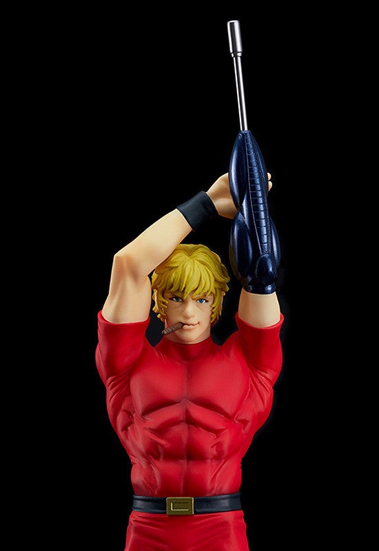 Anime action figure of Cobra in a red outfit holding a blue laser rifle above his head