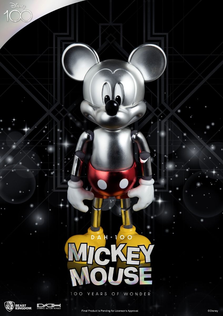 Silver Mickey Mouse figure in red shorts and yellow shoes 100 Years of Wonder edition