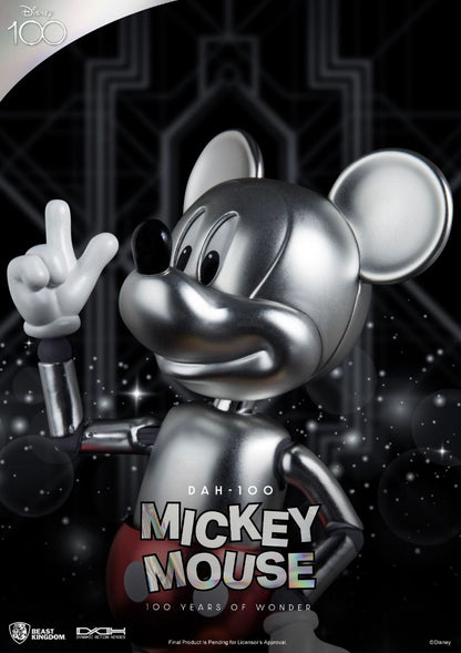 Shiny silver Disney DAH-100 Mickey Mouse action figure against a dark starry background