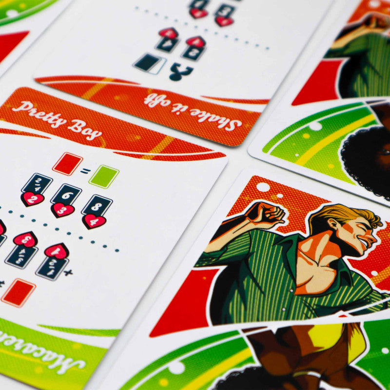 Colorful game cards showing a stylized dancing man, rules for &quot;Shake it off&quot;, and other game elements